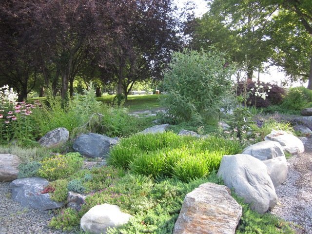 Many decorative stones are inserted into the inner side of the hill. Photo from randallsisland.org