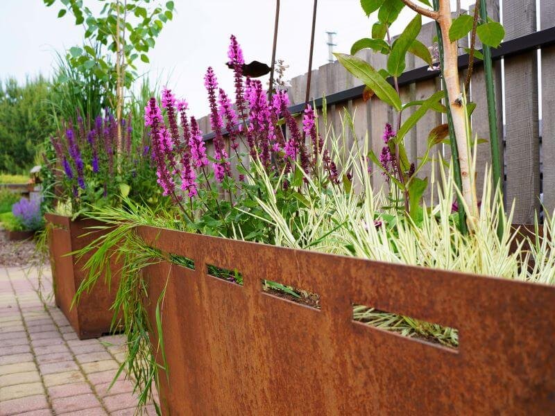 How to spruce up your patio: Choose large, unconventional pots that will add character and style to the space. photo L. Lubertaitė