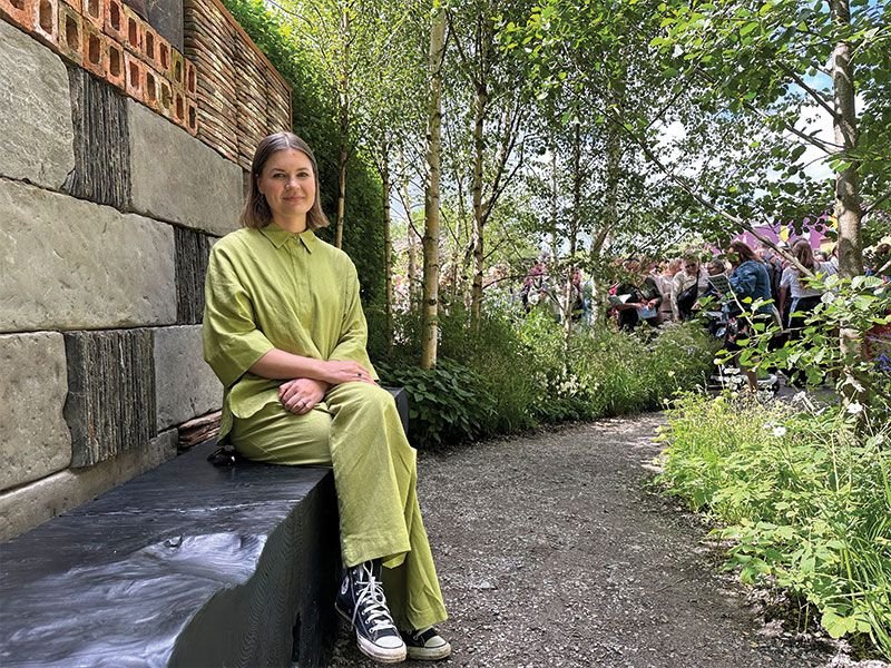 Ła Marija Bujauskaitė in her forest bathing garden, which has become internationally famous. photo Živile Monika Lazauskienė