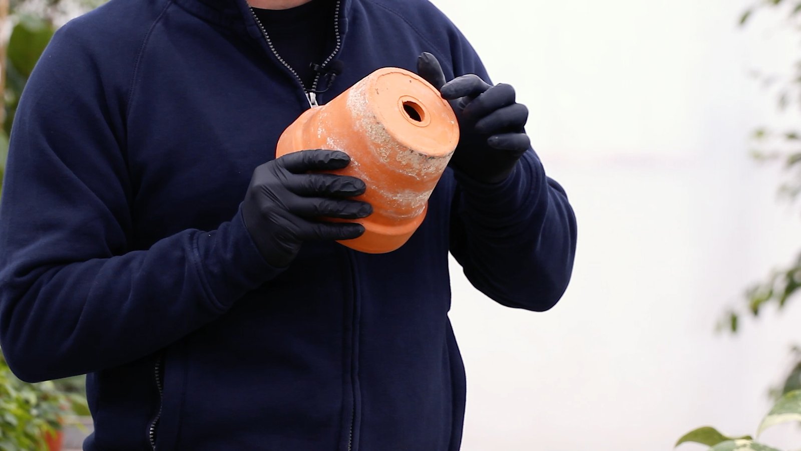 Drainage hole in the bottom of a terracotta pot