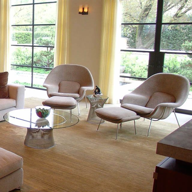 Living room Womb armchair with pouf