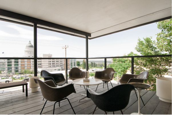 Outdoor space - Tulip chair with armrests by Eero Saarinen