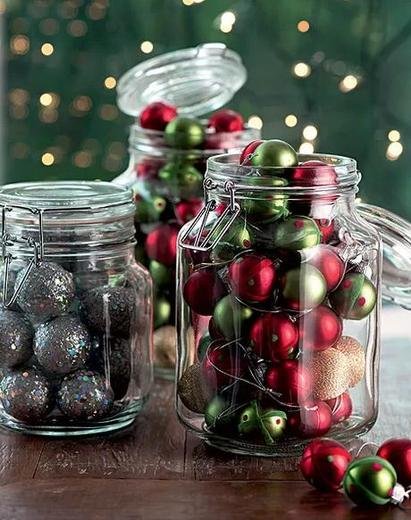 Preserving jars become supports for Christmas decorations