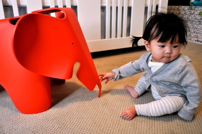     Vitra Eames elephant with a girl