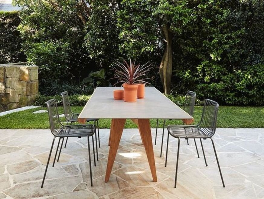 terrace of the house with nolita floor chairs overlooking the garden