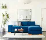 How to organize the living room around a blue sofa